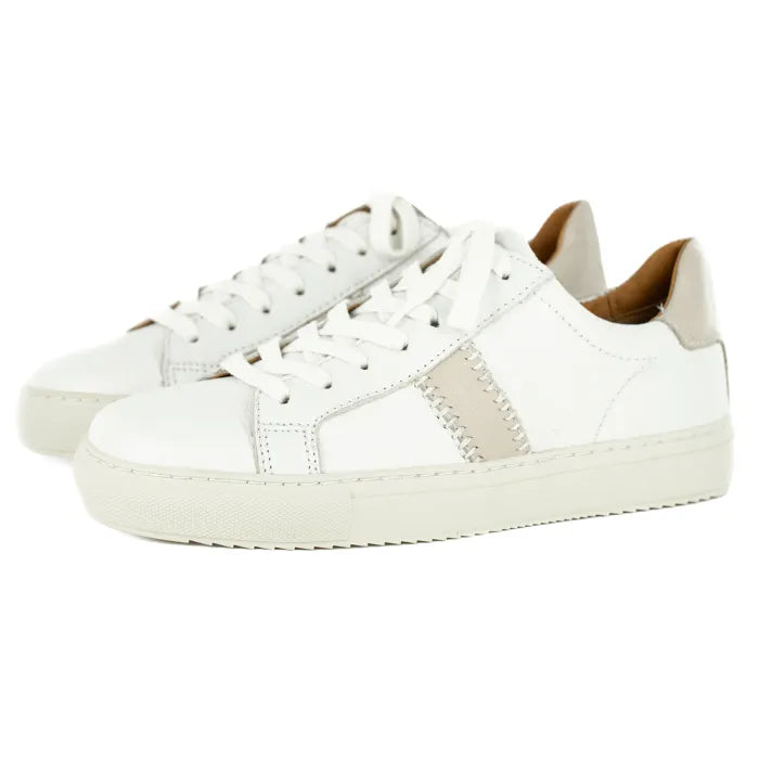 White sneakers with cream accents on a white background