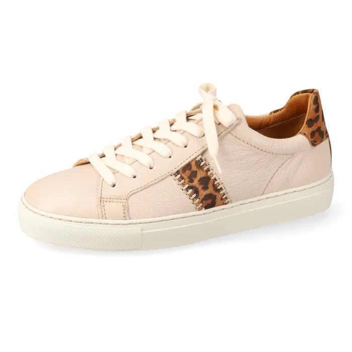 Beige sneaker with leopard print accents on a white background