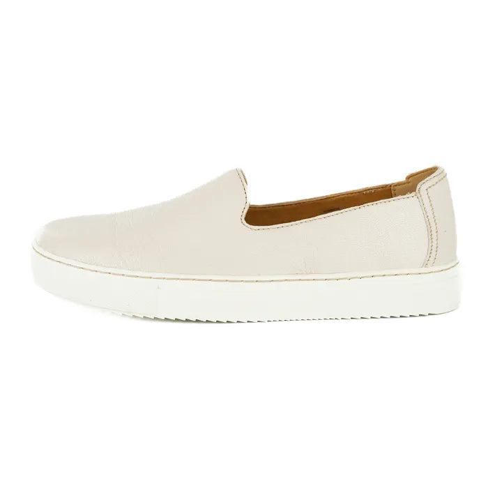 Cream slip-on sneaker on a white background