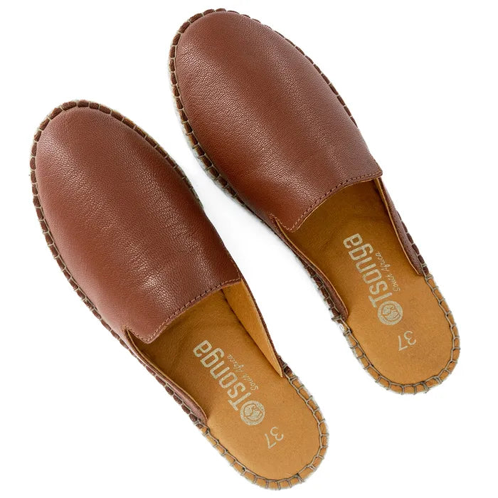 Pair of brown leather slip-on with brand logo on a white background