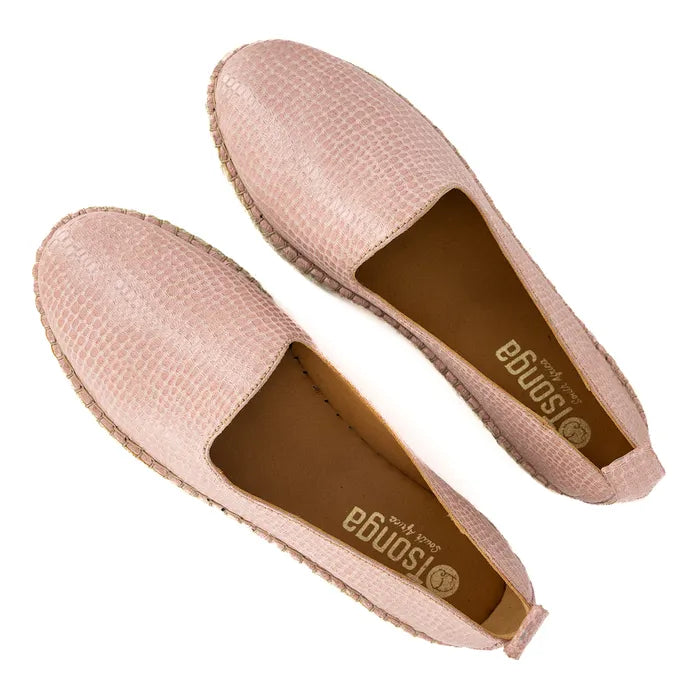 Pair of pink espadrilles with brown soles on a white background