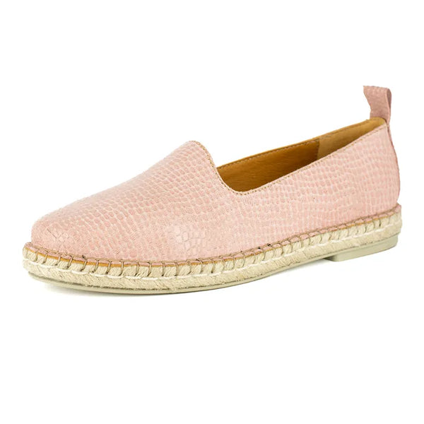 Pink espadrille shoe on a white background
