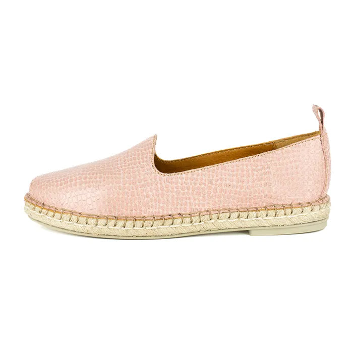 Pink espadrille shoe on a white background