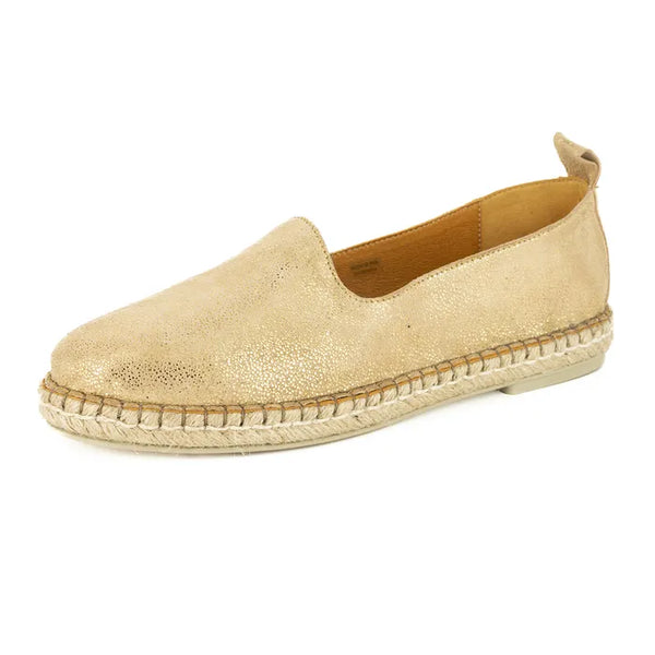 Gold espadrille shoe on a white background