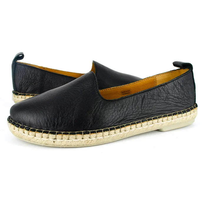 Black leather espadrilles on a white background