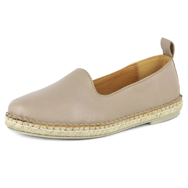 Beige espadrille shoe on a white background