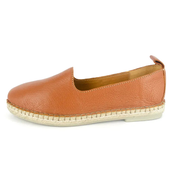 Tan leather espadrille shoe on a white background
