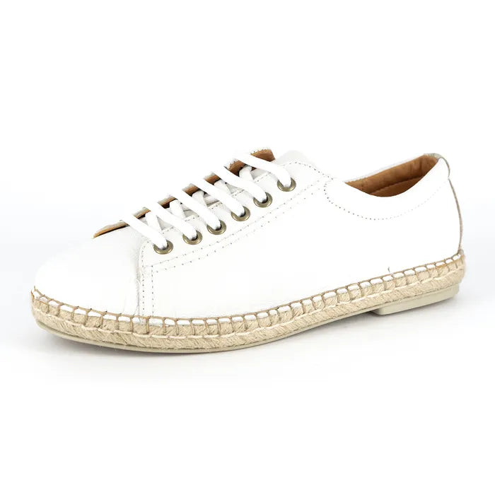 White sneaker with espadrille sole on a white background