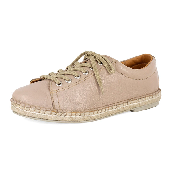 Beige sneaker with espadrille sole on a white background