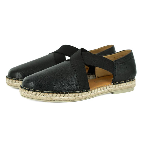 Pair of black leather espadrilles with jute sole on a white background