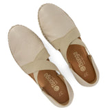 Pair of beige espadrilles with 'Tsonga' branding on a white background