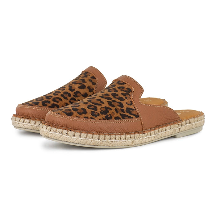 Pair of leopard print espadrilles on a white background