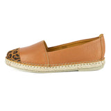 Brown espadrille shoe with leopard print heel tab on a white background