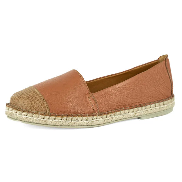 Brown espadrille shoe on a white background