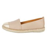 Beige espadrille shoe on a white background