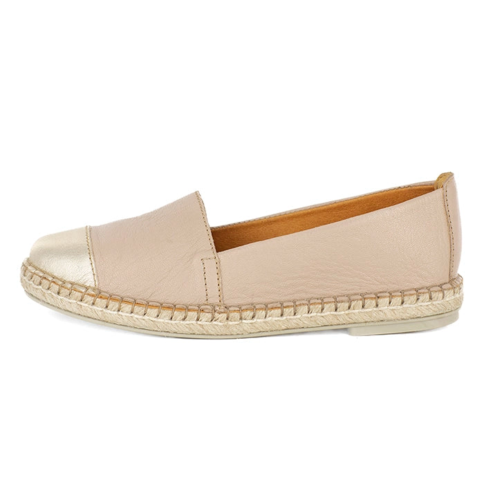 Beige espadrille shoe on a white background