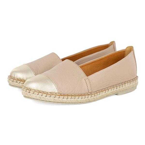 Pair of beige espadrilles with metallic cap-toe on a white background