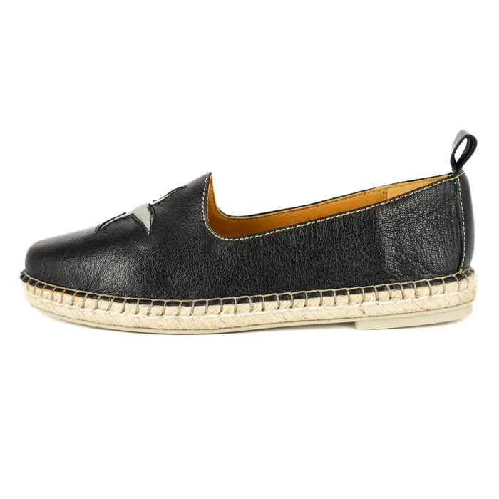 Black leather shoe with beige sole on a white background