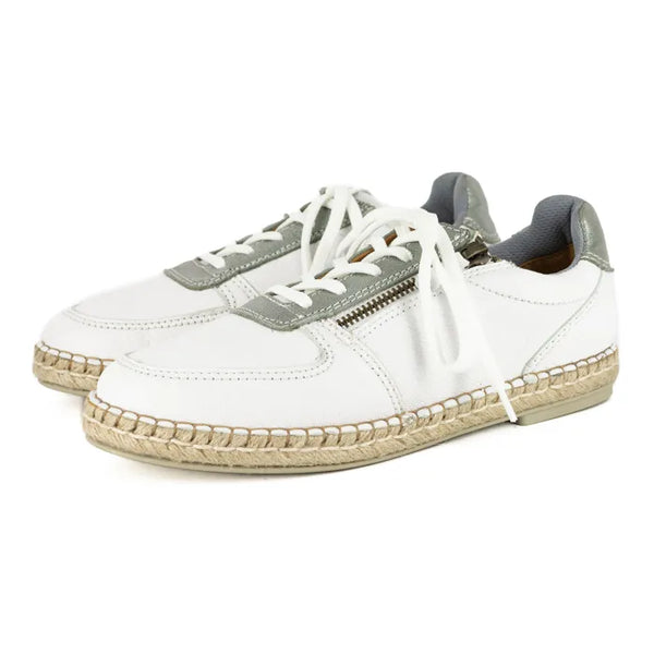White sneakers with silver accents on a white background