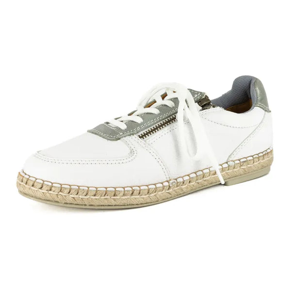 White sneaker with silver accents on a white background