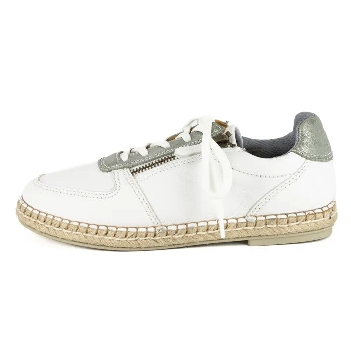 White sneaker with silver accents on a white background