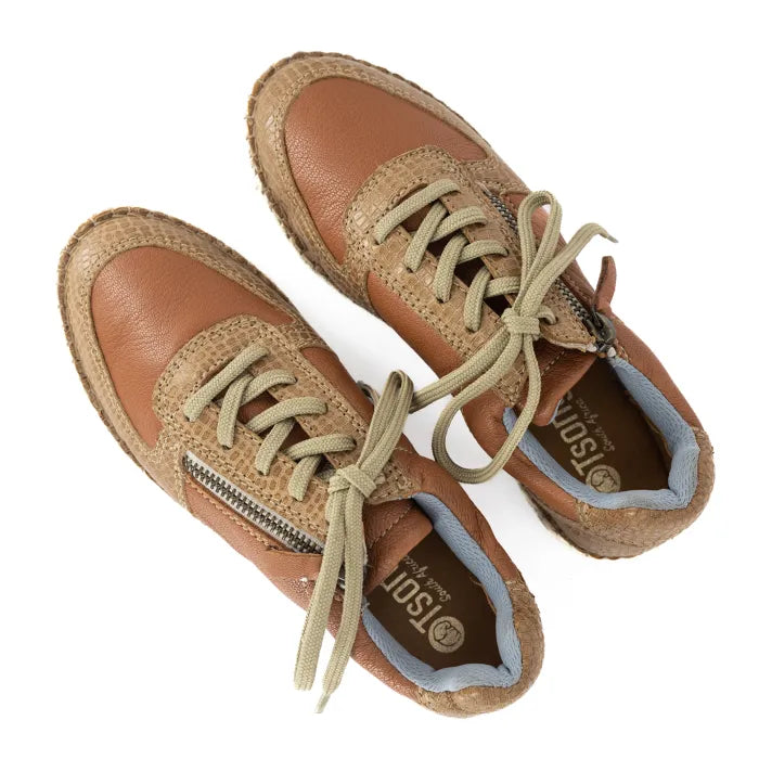 Pair of brown leather shoes with beige laces on a white background