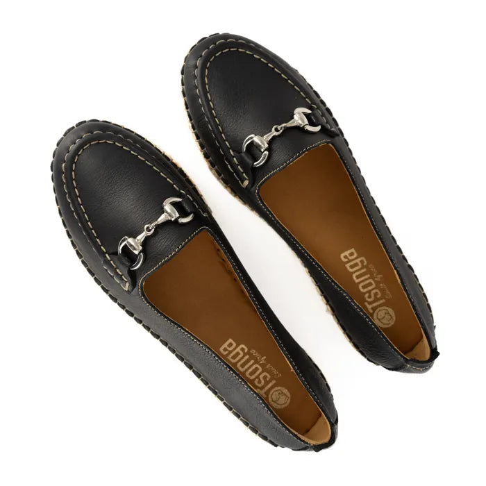 Pair of black loafers with a metallic buckle on a white background