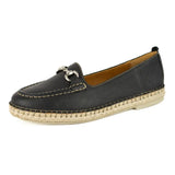 Black loafer with espadrille sole on a white background