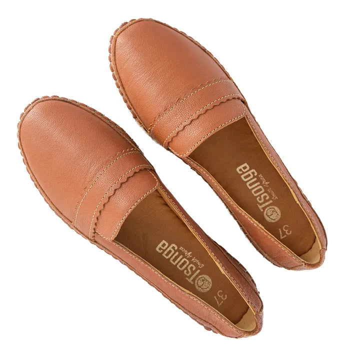 Pair of brown loafers on a white background