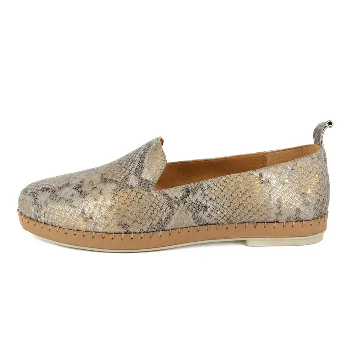 Loafer shoe with snake print pattern on a white background