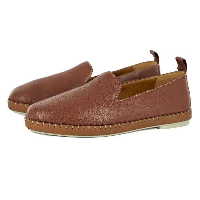 Pair of brown leather loafers on a white background