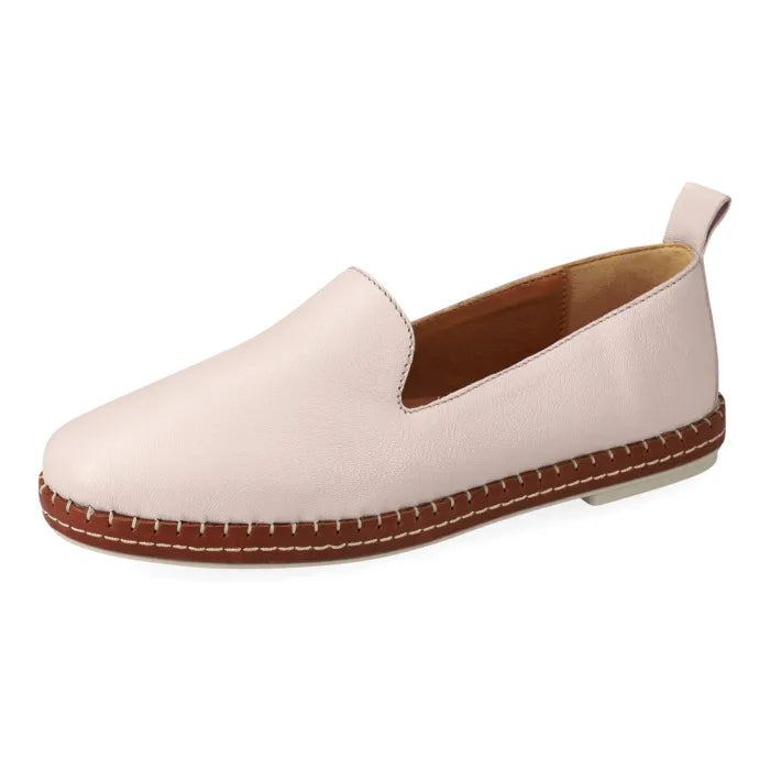 Beige slip-on shoe with brown stitching on a white background