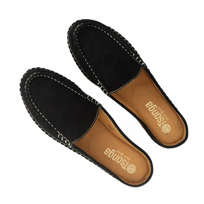 Pair of black slippers with brown soles on a white background