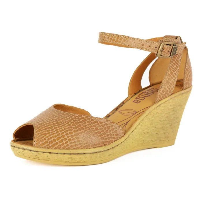 Tan wedge sandal with open toe and wedge sole on a white background