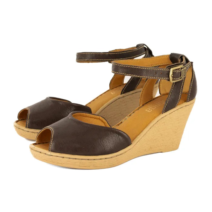 Brown wedge sandals with open toes on a white background