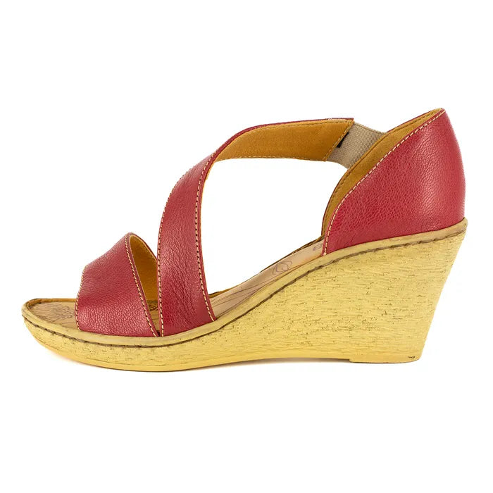 Red wedge sandal with a wedge sole on a white background