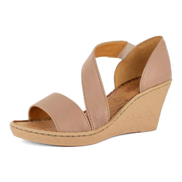 Beige wedge sandal on a white background