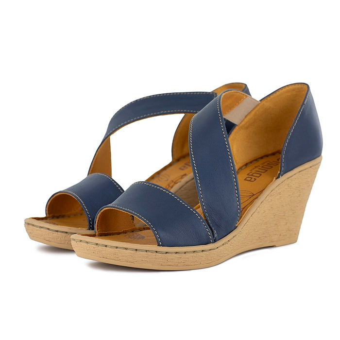 Blue wedge sandals on a white background