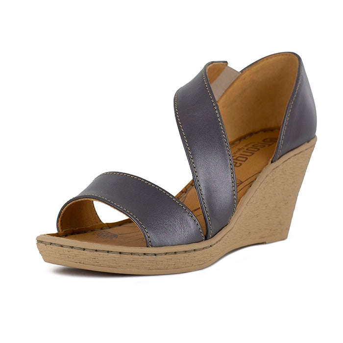 Silver wedge sandal on a white background