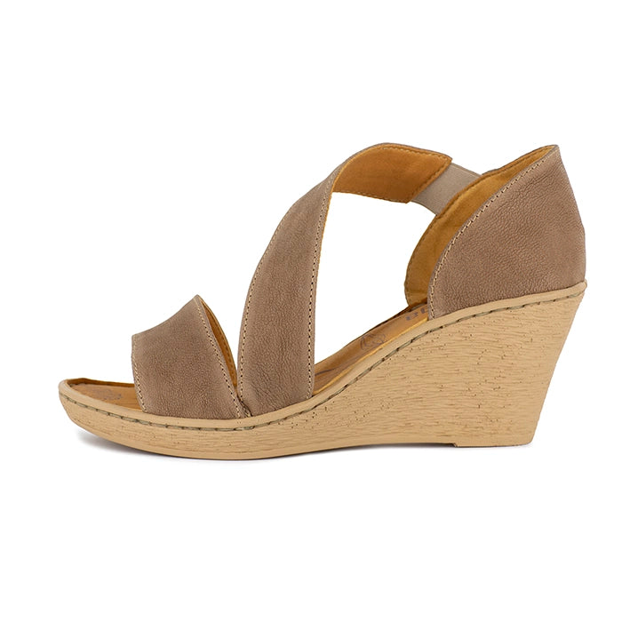 Beige wedge sandal on a white background