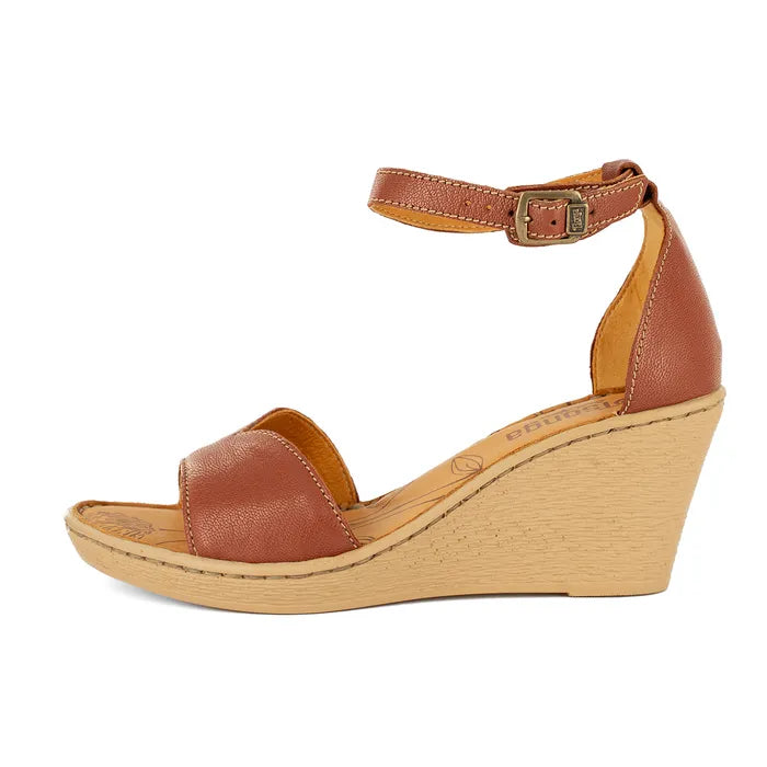 Brown wedge sandal with a beige sole on a white background