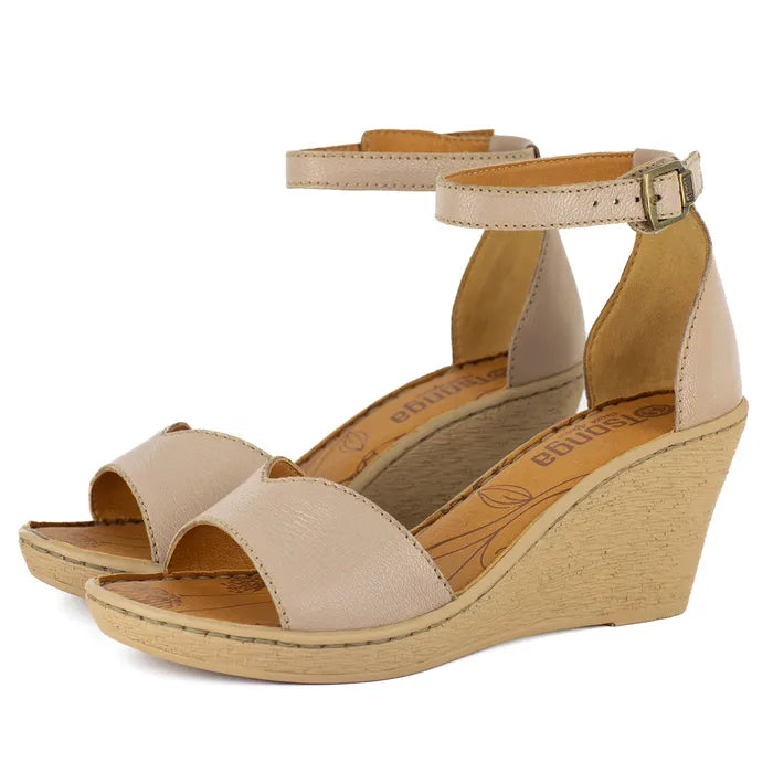 Beige wedge sandals with open-toe design on a white background