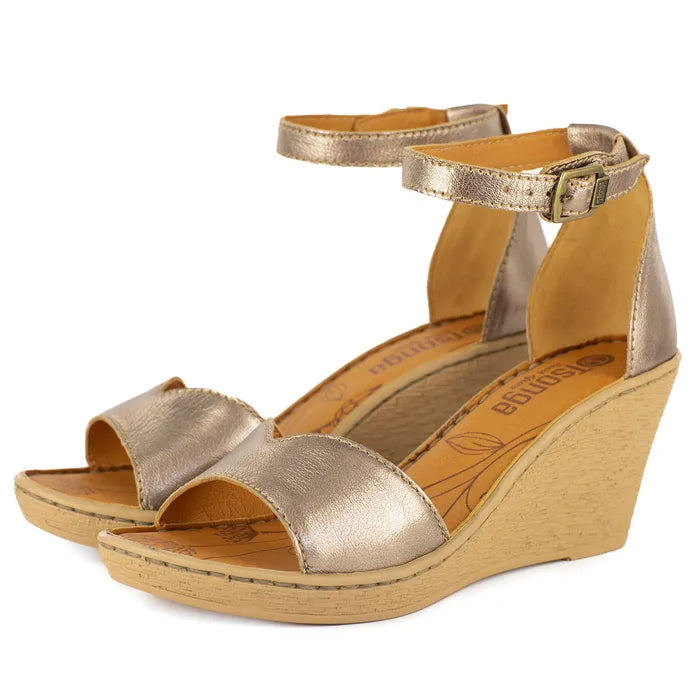 Gold wedge sandals with a visible brand logo on a white background