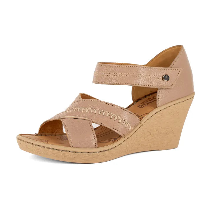 Beige wedge sandal on a white background