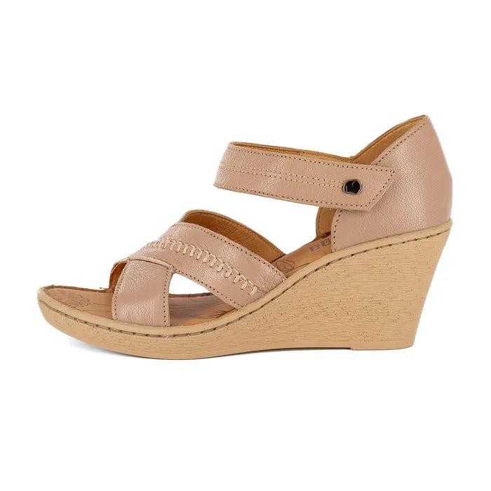 Beige wedge sandal on a white background