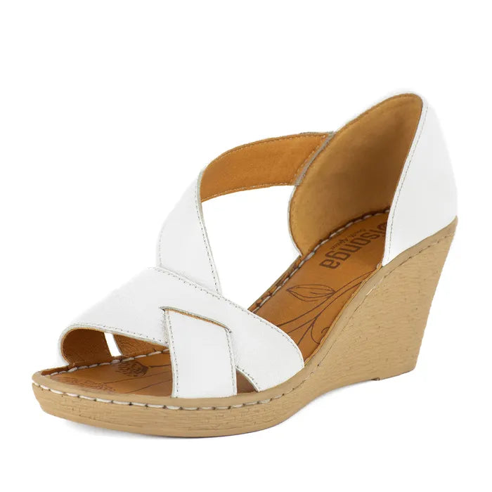 White wedge sandal with beige sole on a white background