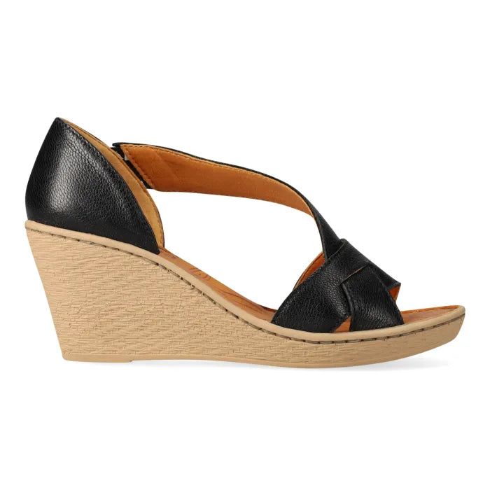Black wedge sandal with a tan sole on a white background