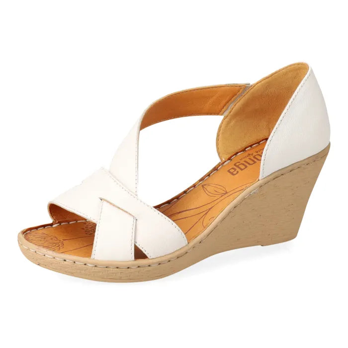 White wedge sandal with tan sole on a white background