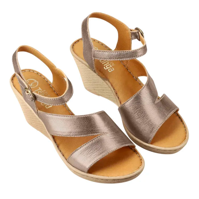 A metallic gold wedge sandal with a cutout toe, ankle strap, and tan insole, shown against a plain white background.
