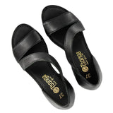 Black sandals with 'Tsonga' branding on a white background